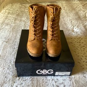 These cute boots are from G by Guess. They’re brownish with a chunky heel size 8